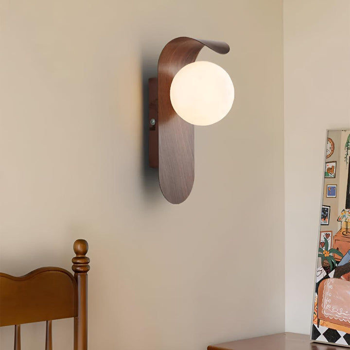 Wall Light With Curved Design And Glass Globe